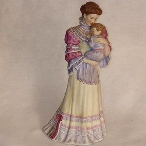 A Lenox porcelain figure of a mother and child